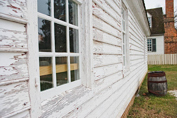 istock House with windows,  chimney and barrel 182400369