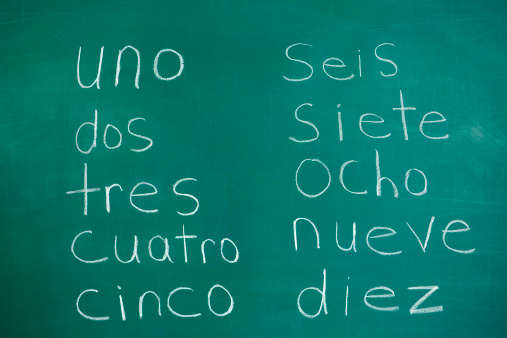 Numbers one through ten in Spanish on a chalkboard.Please also see: