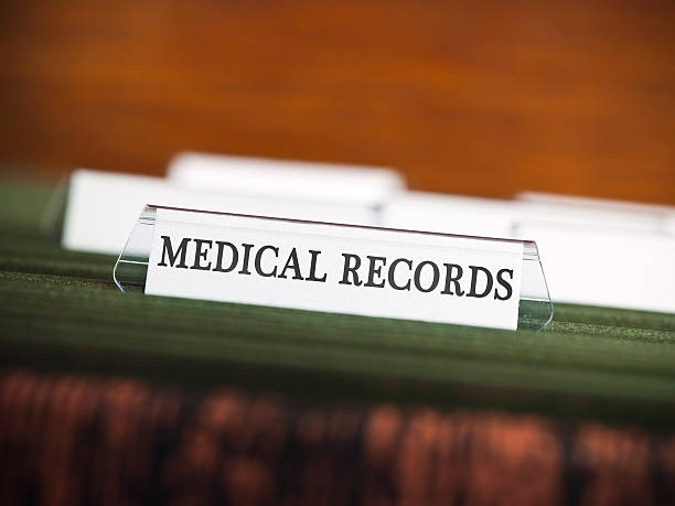 istock Blank hospital file in a filing cabinet 182401183