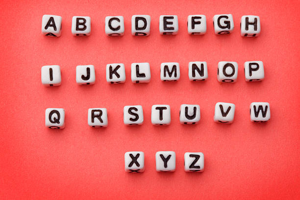 alphabet perlen - perlenschnur stock-fotos und bilder