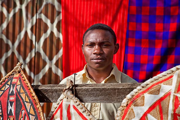Young masaj man in front of traditional cloth. Young masaj man in front of traditional cloth.See also my LB: kenyan man stock pictures, royalty-free photos & images