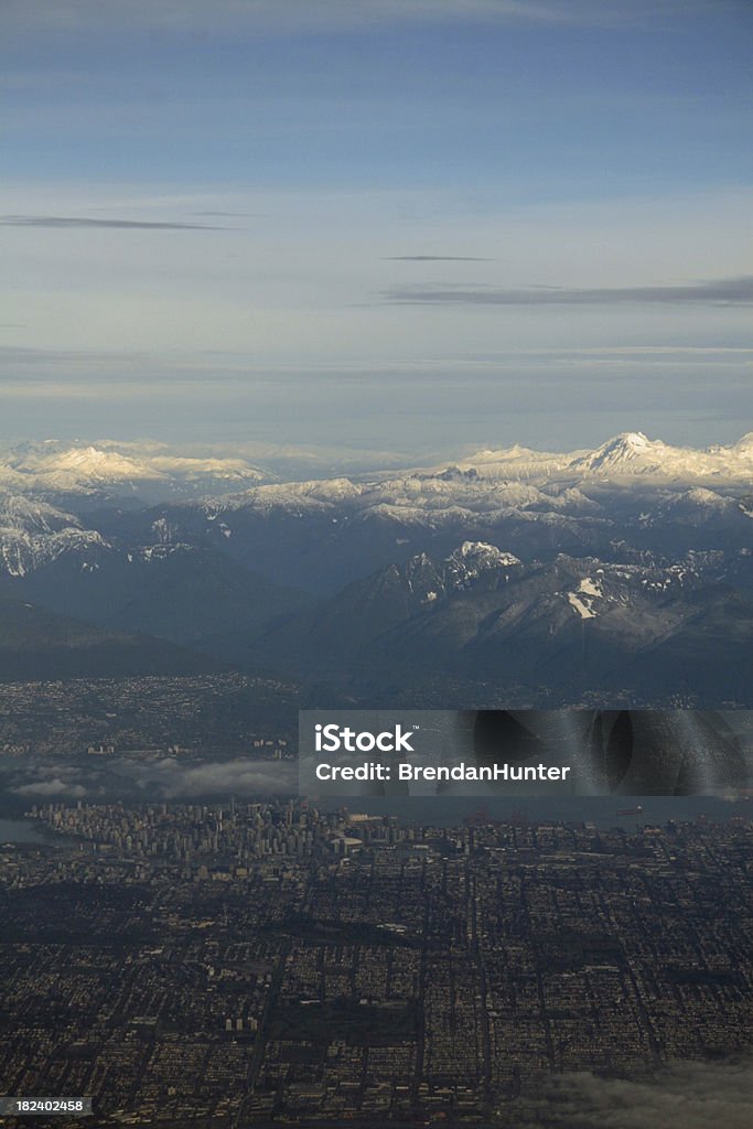 Vancouver and the Coastal Range Looking down at the city of Vancouver and the Coastal Mountain Range. British Columbia Stock Photo