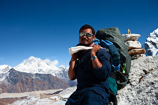 istock Nepali porter against a background of Mount Everest 182402470