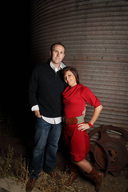istock Young Couple Embracing In The Dark 182403011
