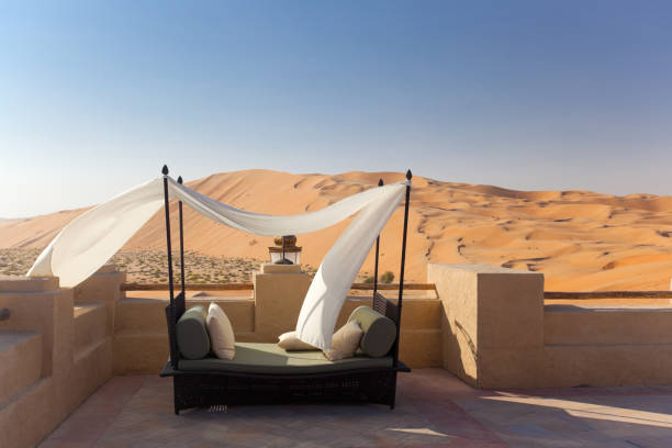 luxury bed in the desert beautiful scene of 1001 nights africa travel stock pictures, royalty-free photos & images
