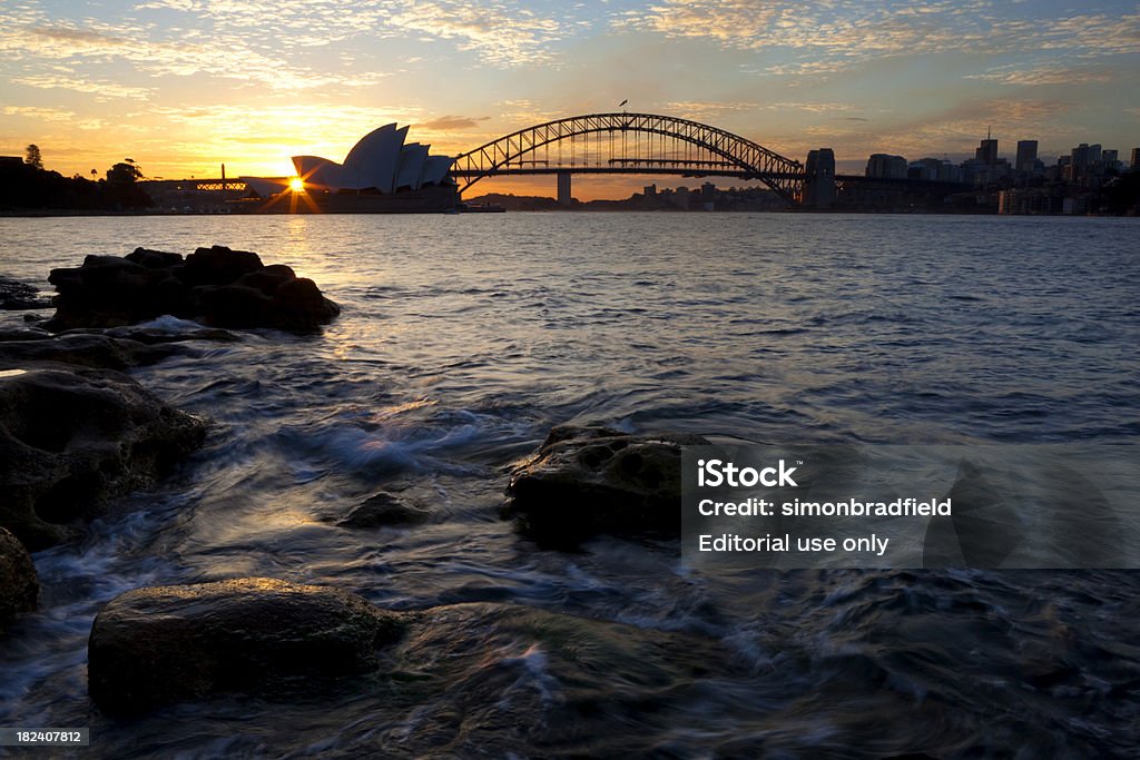 Sydney Harbour At Dusk "The sun sets over Sydney, with one final appearance   next to the famous Opera House." Australia Stock Photo