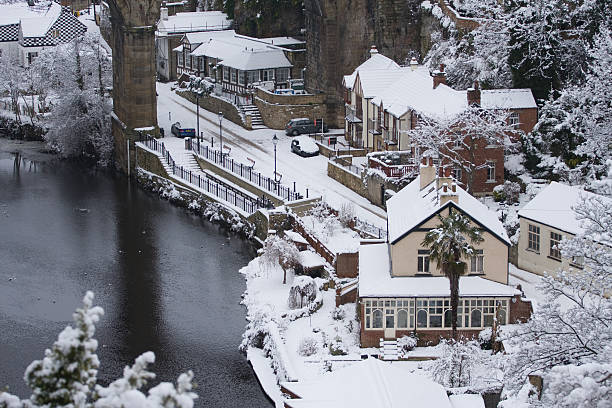 istock knaresborough yorkshire waterside in snow 182408517