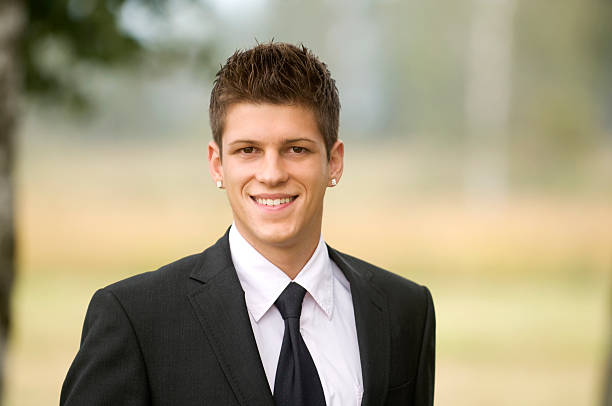 Portrait of a junior businessman smiling stock photo