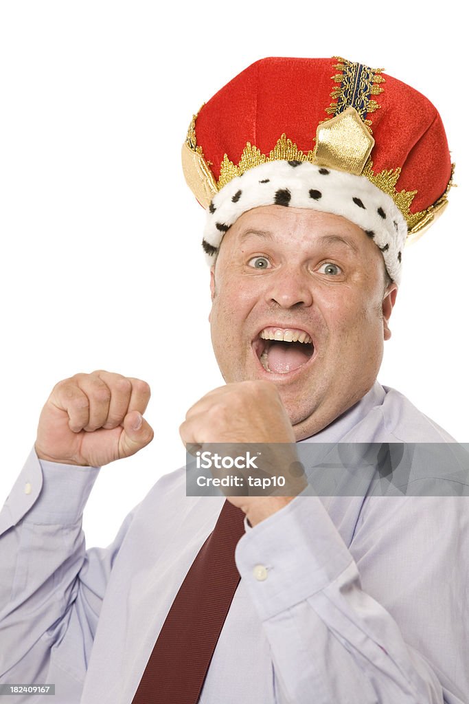 Happy King A man wearing a crown with a happy expression. Adult Stock Photo