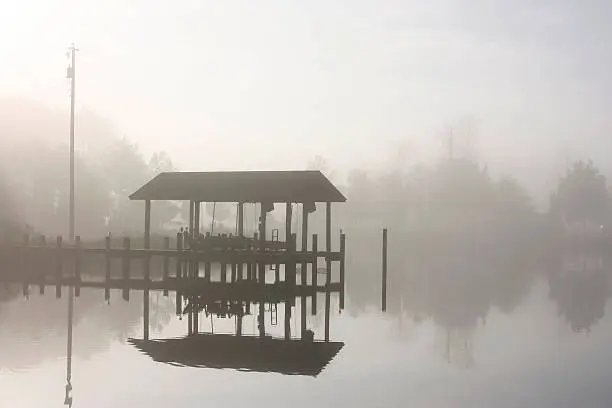 Photo of Boat dock in the early morning fog