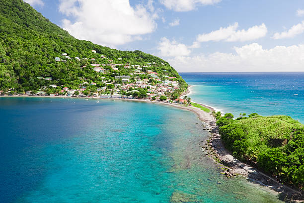caribbean island "Dominica, a caribbean island. The village of Scotts Head, south-western tip of the island (Soufri&#232;re Bay)." fishing village photos stock pictures, royalty-free photos & images