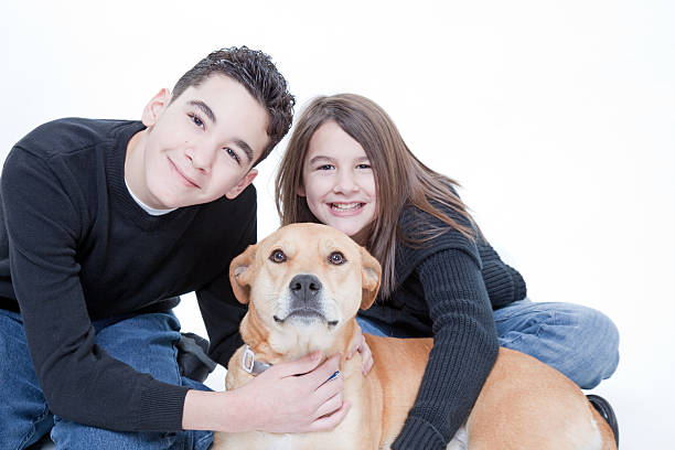 istock Brother Sister and Dog 182410414