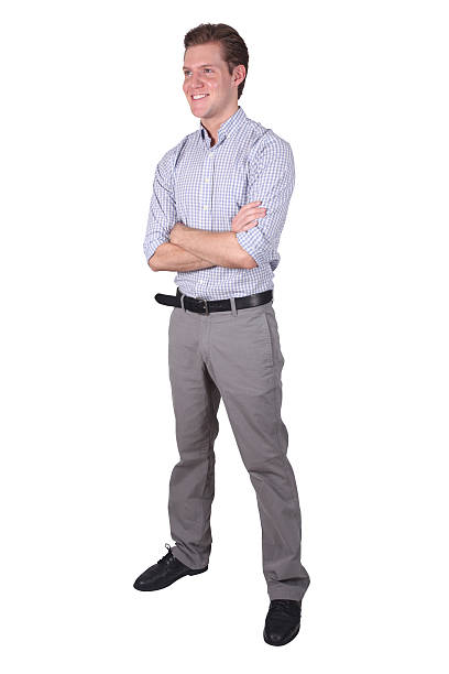 istock Isolated young businessman standing arms folded 182411244