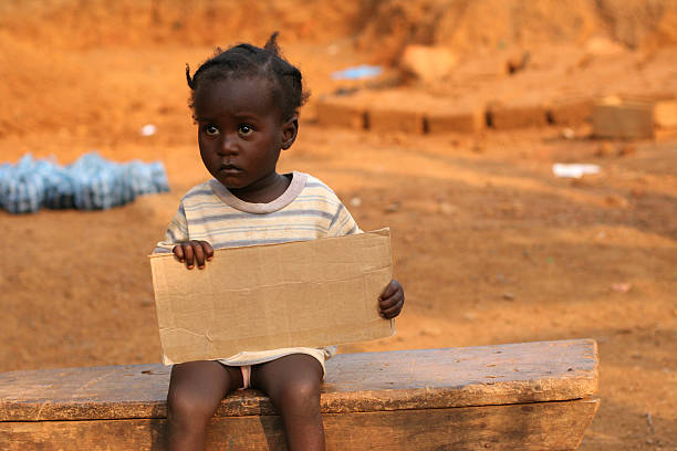 istock African Child Holding Sign 182411944