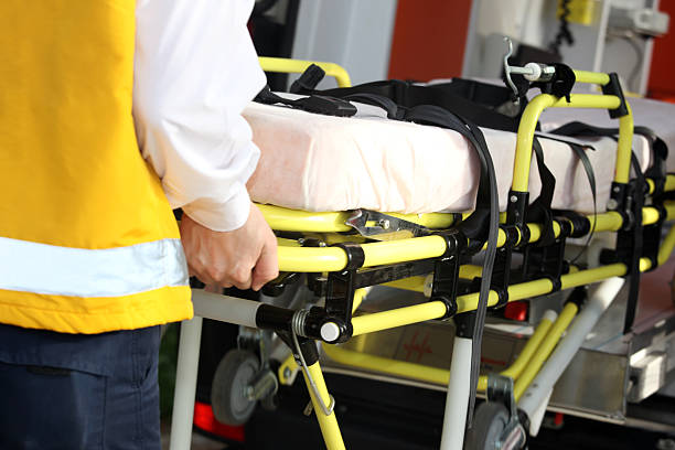 istock A stretcher being placed in to a ambulance 182412356