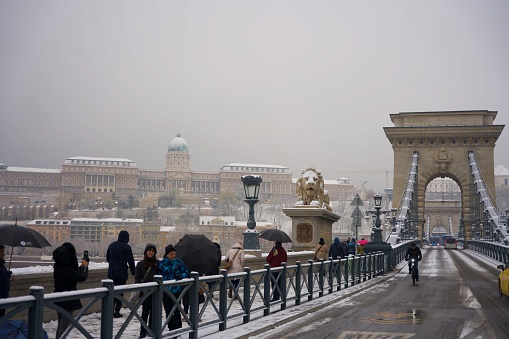 Budapest, Hungary - November 30, 2023: Snowy Chain Bridge.
