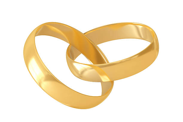 istock Two gold interlocked wedding rings on white background 182413096