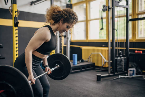 istock Fit woman weightlifting 1824131759