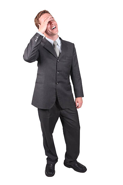 istock Isolated businessman hand on forehead laughing 182413290