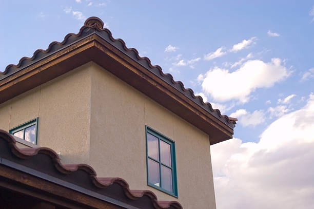 istock Spanish Tile Roof and Clouds 182413414