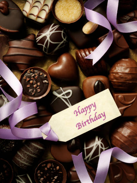 istock Chocolates and Purple Ribbon 182413493