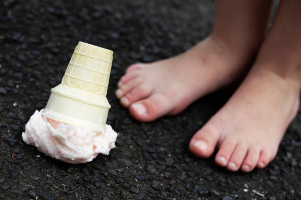 istock Dropped Ice Cream and Feet 182413579