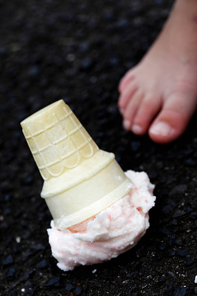 istock Dropped Ice Cream and Feet 182413580