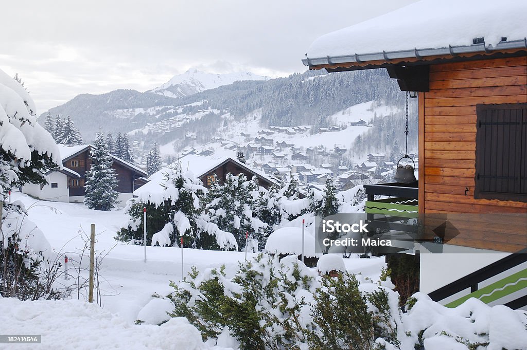 Alpine landscape with houses Alpine landscape at a small french village. Snowed.Snow Holidays Abundance Stock Photo