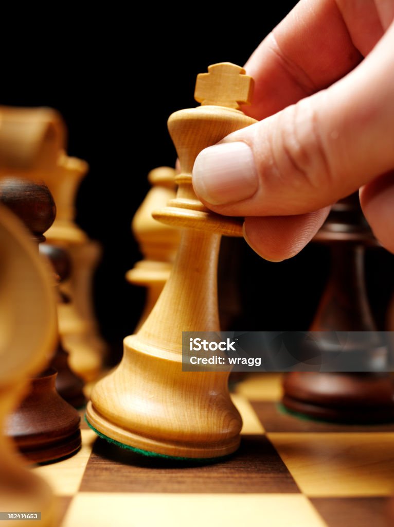 Moving the King in a Game of Chess Moving the king in a game of chess.Click on the link below to see more of my chess and sport images Chess Stock Photo