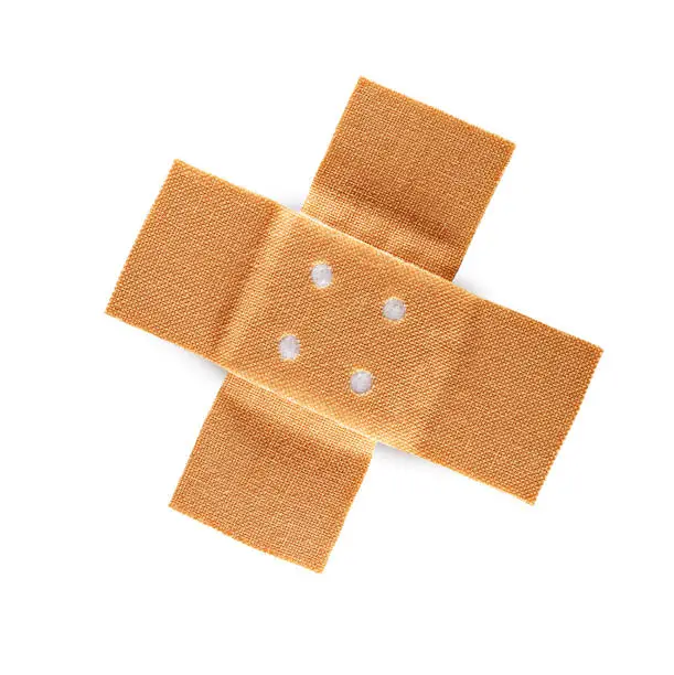 crossed band-aid isolated on white