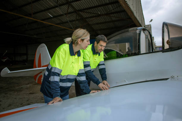 istock Woman and man inspected airplane 1824157199