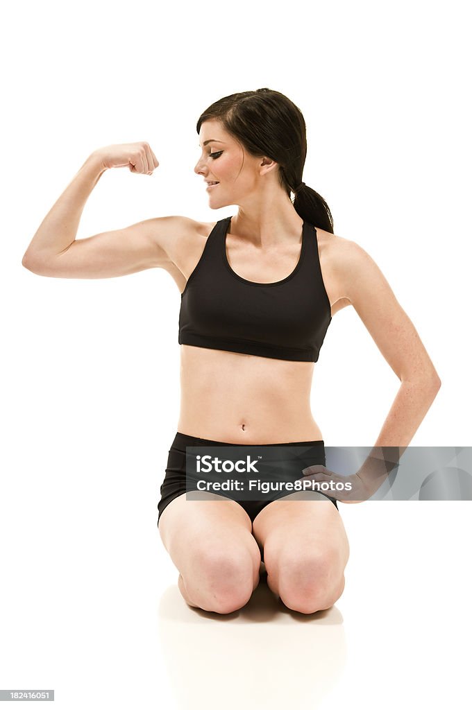 Feminino Flexionando Músculos - Foto de stock de 18-19 Anos royalty-free