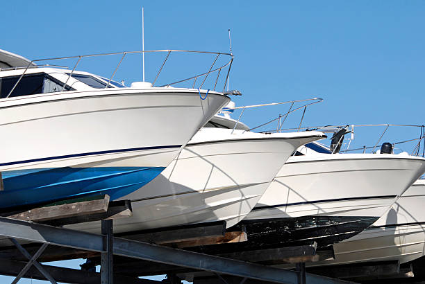 Yachts in storage Yachts in storage in boatyard dry dock stock pictures, royalty-free photos & images
