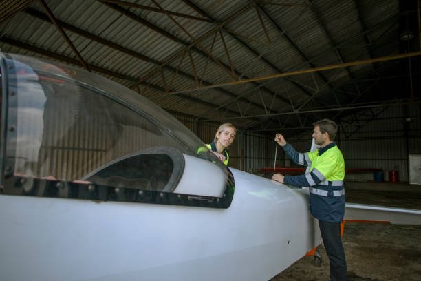istock Woman and man inspected airplane 1824162538