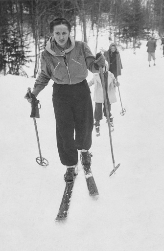 Group of people skiing on European Alps, 1940.