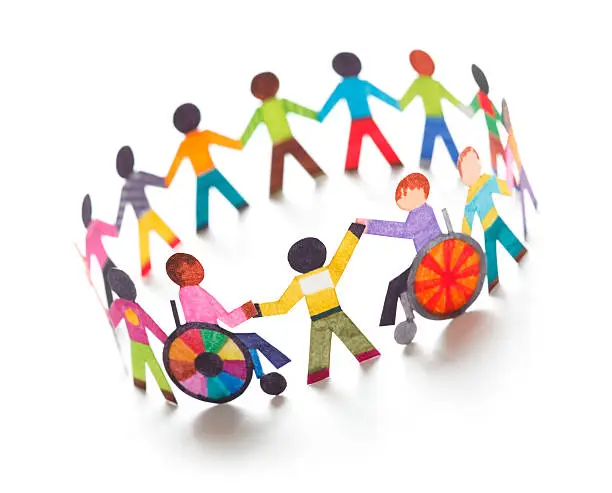 Ethnic circle with handicapped person - paper concept.