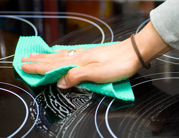istock cleaning cookingfield - cleaning ceramic hob 182416538