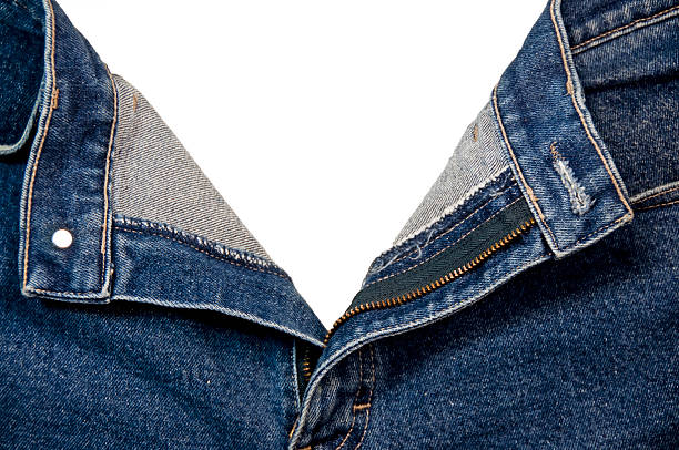 aprire un paio di jeans con clipping path - fully unbuttoned immagine foto e immagini stock