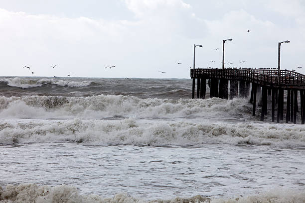 istock Stormy Waves against a Pier 182417007