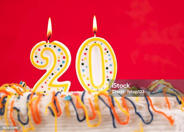 Decorated Birthday Cake With Number 20 Buring Candles Red Background Stock Photo - Download Image Now