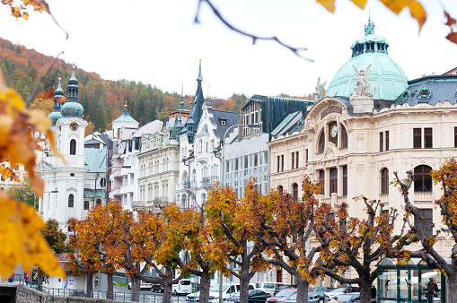 city in the middle of an autumn forest, a famous spa town of Karlovy Vary in the Czech Republic