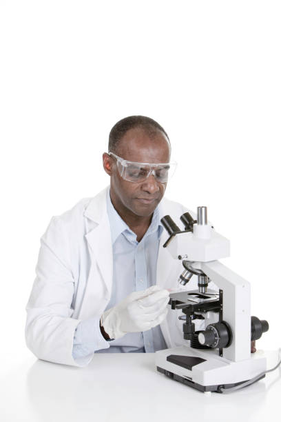 Black Man Researcher or Scientist Medical or scientific lab researcher with microscope isolate on white. microscope isolated stock pictures, royalty-free photos & images