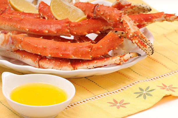 istock Crab legs served with lemon and butter 182418138