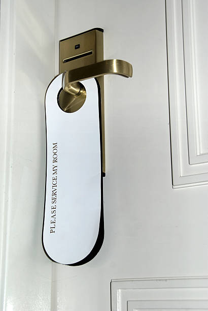 istock Do Not Disturb sign hanging on doorknob 182418143