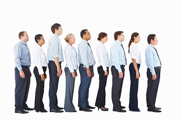 istock Side view of business colleagues in a line 182418541