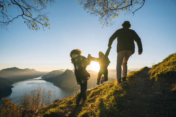 istock Family enjoys time together on mountain top 1824191182