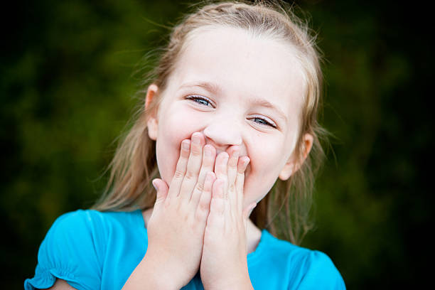 istock Happy Young Girl Laughing Outside 182419202