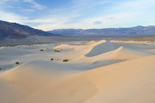 Mesquite Sand Dunes located within Death Valley National Park. This is a popular travel destination for adventure seekers.