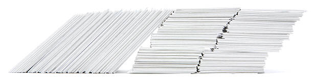 istock Three stacks of hand trimmed cards 182419904