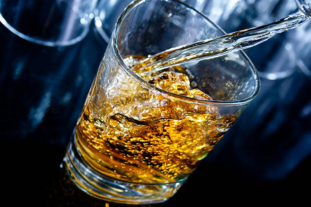 istock Pouring whiskey in a glass 182419958